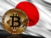 Gold,Coin,Bitcoin,On,A,Background,Of,A,Flag,Japan